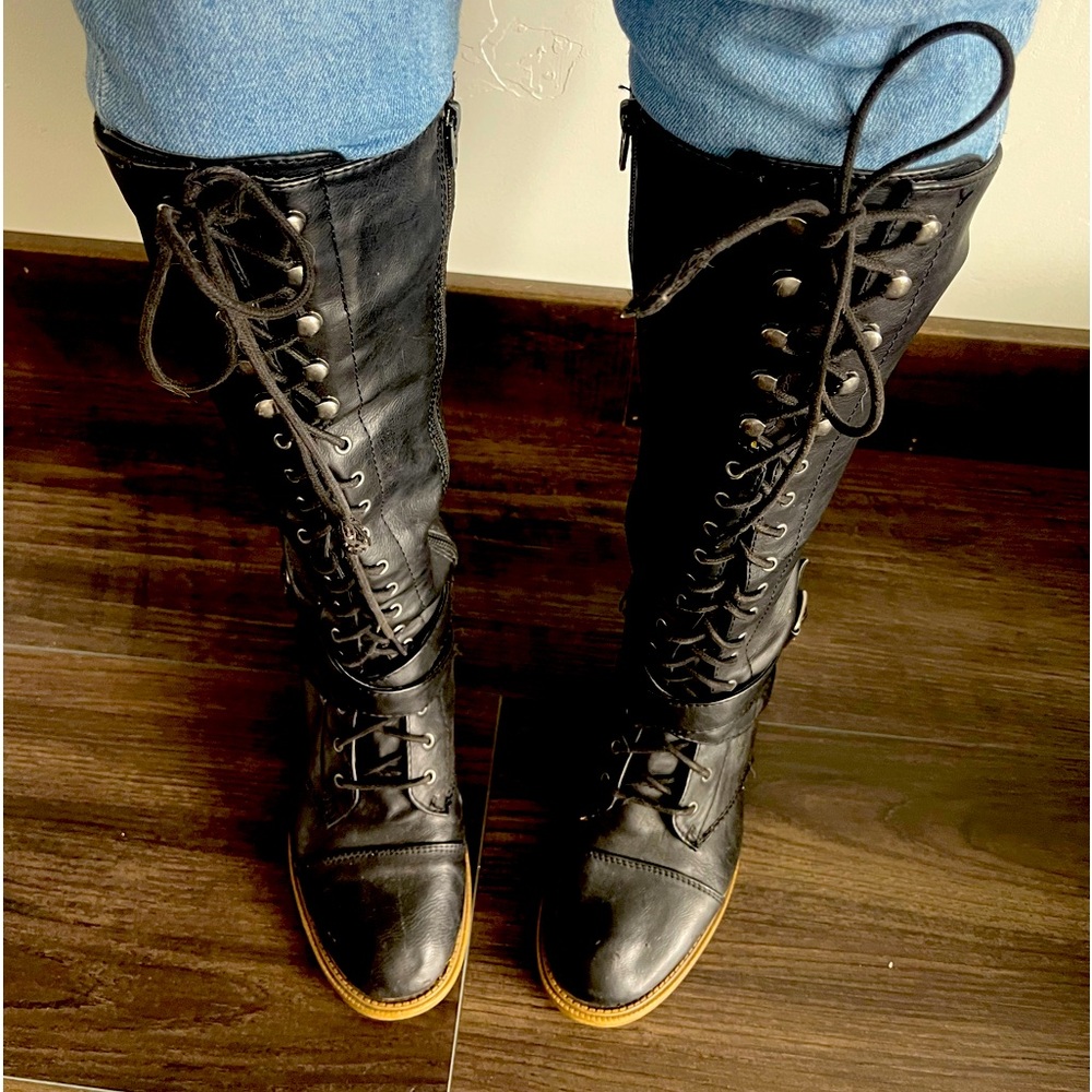 Used black leather boots